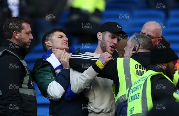 120120 - Cardiff City v Swansea City - SkyBet Championship - Cardiff fans have an altercation with security staff after the game 