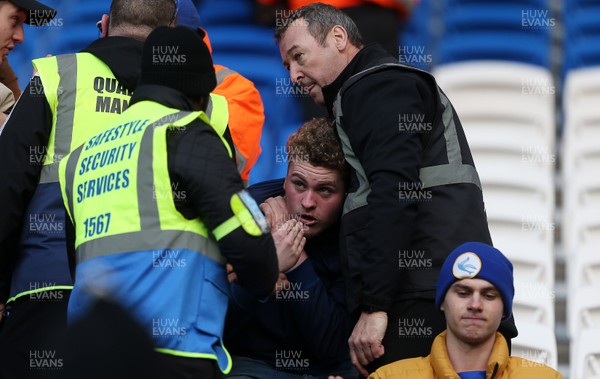 120120 - Cardiff City v Swansea City - SkyBet Championship - Cardiff fans have an altercation with security staff after the game 