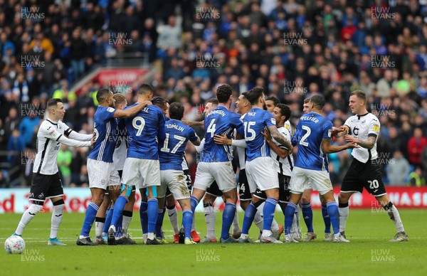 120120 - Cardiff City v Swansea City, Sky Bet Championship - The two team square up to one another after Ben Cabango of Swansea City and Robert Glatzel of Cardiff City collide