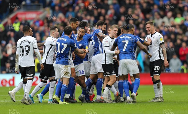 120120 - Cardiff City v Swansea City, Sky Bet Championship - The two team square up to one another after Ben Cabango of Swansea City and Robert Glatzel of Cardiff City collide