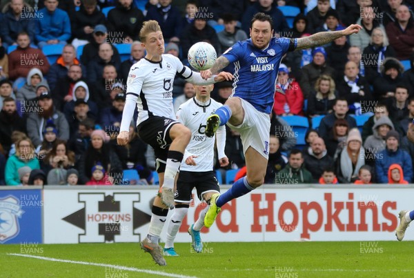 120120 - Cardiff City v Swansea City, Sky Bet Championship - George Byers of Swansea City and Lee Tomlin of Cardiff City compete for the ball