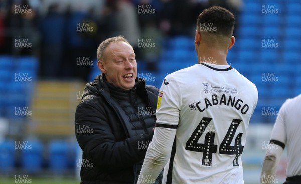 120120 - Cardiff City v Swansea City, Sky Bet Championship - Swansea City head coach Steve Cooper with Ben Cabango of Swansea City at the end of the match