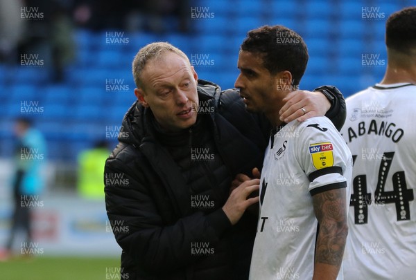 120120 - Cardiff City v Swansea City, Sky Bet Championship - Swansea City head coach Steve Cooper with Kyle Naughton of Swansea City at the end of the match