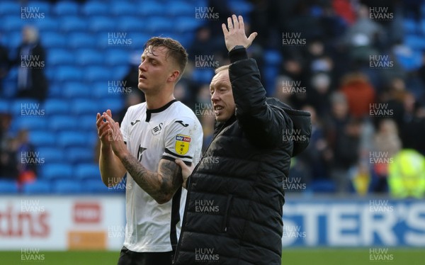 120120 - Cardiff City v Swansea City, Sky Bet Championship - Swansea City head coach Steve Cooper with Ben Wilmot of Swansea City at the end of the match