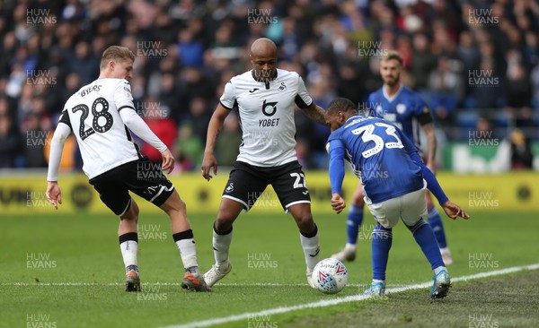 120120 - Cardiff City v Swansea City, Sky Bet Championship - Junior Hoilett of Cardiff City is closed down by George Byers of Swansea City and Andre Ayew of Swansea City