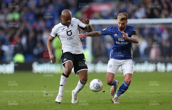 120120 - Cardiff City v Swansea City, Sky Bet Championship - Andre Ayew of Swansea City and Joe Bennett of Cardiff City compete for the ball