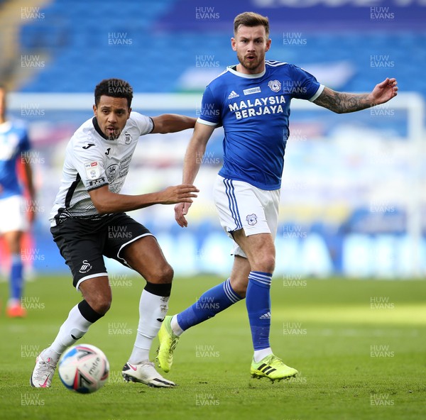 121220 - Cardiff City v Swansea City - SkyBet Championship - Joe Ralls of Cardiff City is challenged by Korey Smith of Swansea City