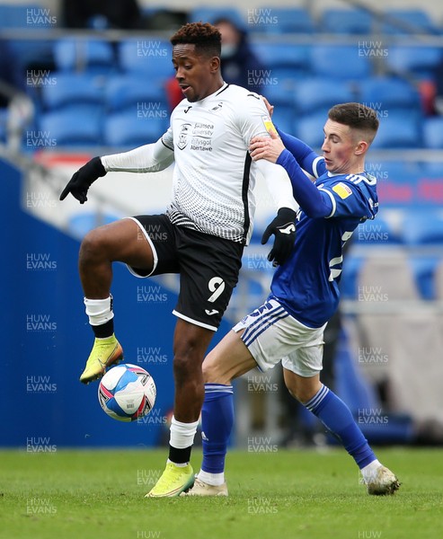 121220 - Cardiff City v Swansea City - SkyBet Championship - Jamal Lowe of Swansea City is challenged by Harry Wilson of Cardiff City