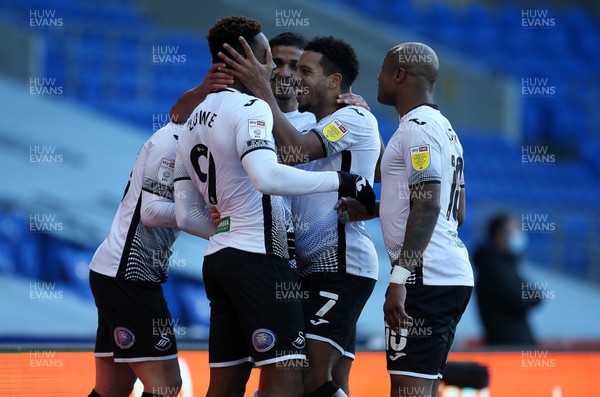 121220 - Cardiff City v Swansea City - SkyBet Championship - Jamal Lowe of Swansea City celebrates scoring their second goal with team mates