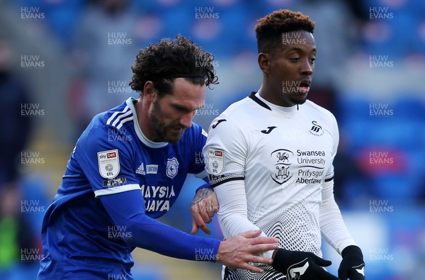121220 - Cardiff City v Swansea City - SkyBet Championship - Jamal Lowe of Swansea City is chased down by Sean Morrison of Cardiff City