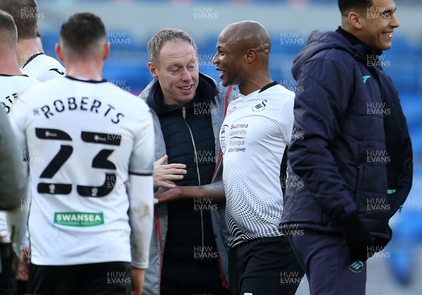 121220 - Cardiff City v Swansea City - SkyBet Championship - Swansea City Manager Steve Cooper and Andre Ayew of Swansea City at full time