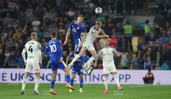 160923 - Cardiff City v Swansea City, EFL Sky Bet Championship - Mark McGuinness of Cardiff City and Harry Darling of Swansea City compete for the ball