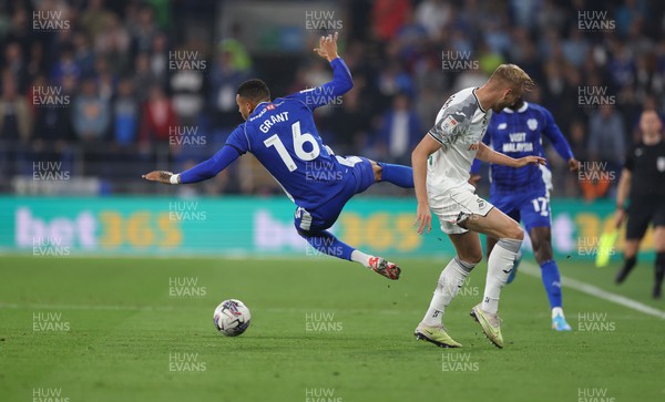 160923 - Cardiff City v Swansea City, EFL Sky Bet Championship - Karlan Grant of Cardiff City is upended by Harry Darling of Swansea City