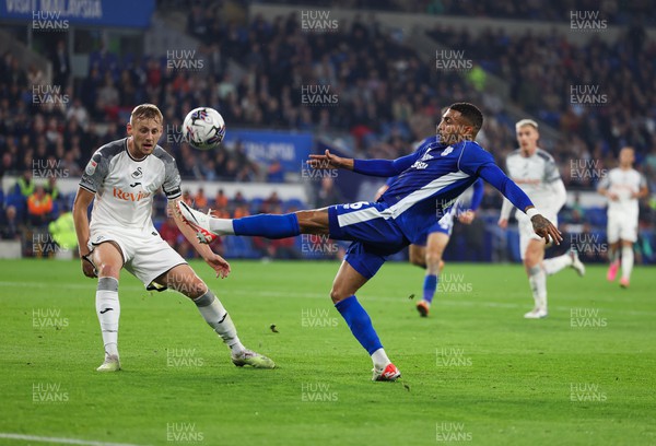 160923 - Cardiff City v Swansea City, EFL Sky Bet Championship - Karlan Grant of Cardiff City crosses as Harry Darling of Swansea City closes in