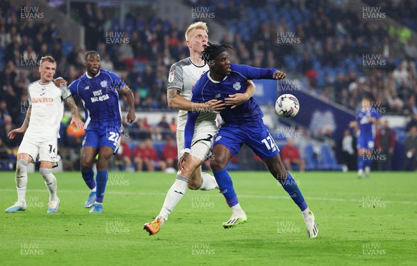 160923 - Cardiff City v Swansea City, EFL Sky Bet Championship - Ike Ugbo of Cardiff City and Kristian Pedersen of Swansea City compete for the ball