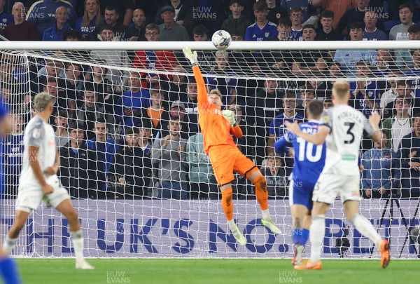 160923 - Cardiff City v Swansea City, EFL Sky Bet Championship - Swansea City goalkeeper Carl Rushworth tips a shot from Yakou Meite of Cardiff City over the bar