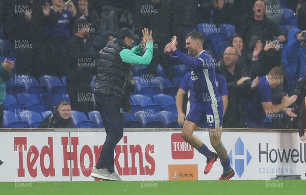 160923 - Cardiff City v Swansea City, EFL Sky Bet Championship - Aaron Ramsey of Cardiff City celebrates with Cardiff City manager Erol Bulut after he scores penalty