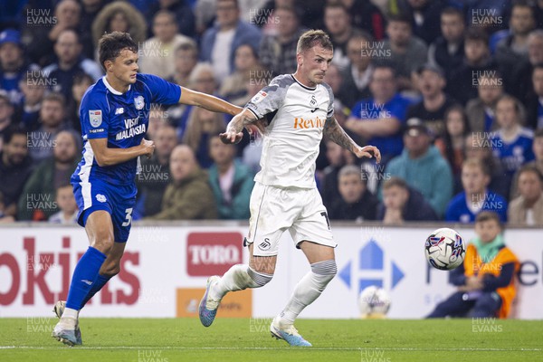 160923 - Cardiff City v Swansea City - Sky Bet Championship - Josh Tymon of Swansea City in action against Perry Ng of Cardiff City