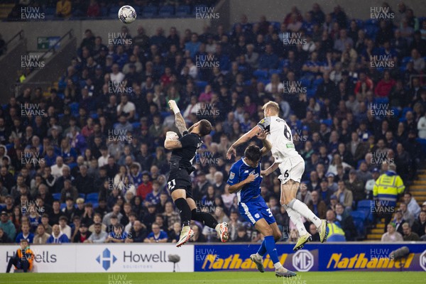 160923 - Cardiff City v Swansea City - Sky Bet Championship - Cardiff City goalkeeper Jak Alnwick punches clear from Harry Darling of Swansea City