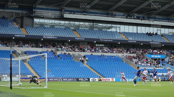 080826 - Cardiff City v Swindon Town, EFL Carabao Cup - Yousef Salech of Cardiff City scores from the penalty spot