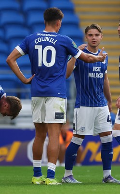 120825 - Cardiff City v Swindon Town, EFL Carabao Cup, Round 1 - Cian Ashford of Cardiff City celebrates with Rubin Colwill of Cardiff City after scoring the opening goal