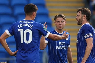 120825 - Cardiff City v Swindon Town, EFL Carabao Cup, Round 1 - Cian Ashford of Cardiff City celebrates with Rubin Colwill of Cardiff City after scoring the opening goal