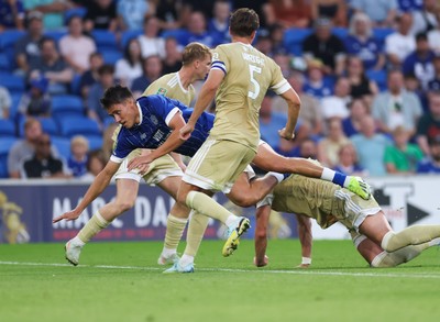 120825 - Cardiff City v Swindon Town, EFL Carabao Cup, Round 1 - Rubin Colwill of Cardiff City is brought down on the edge of the penalty box