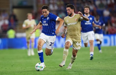 120825 - Cardiff City v Swindon Town, EFL Carabao Cup, Round 1 - Joel Colwill of Cardiff City takes on Darren Oldaker of Swindon Town