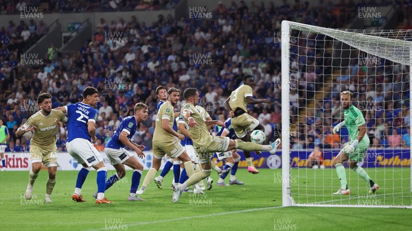 120825 - Cardiff City v Swindon Town, EFL Carabao Cup, Round 1 - James Ball of Swindon Town clears the ball off the line to deny Calum Chambers of Cardiff City a goal
