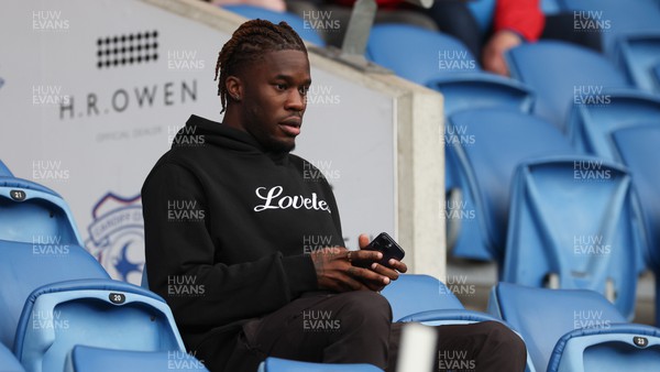 040723 - Cardiff City v The New Saints, Pre season friendly - Cardiff City new signing Ike Ugbo watches from the directors box