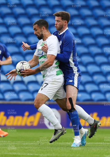 040723 - Cardiff City v The New Saints, Pre season friendly - Jordan Williams of TNS is challenged by Jack Simpson of Cardiff City