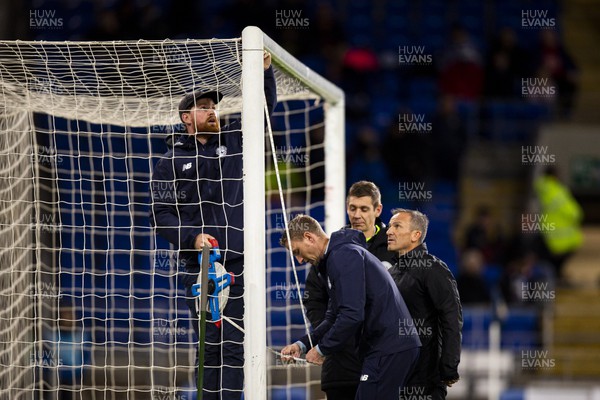 021122 - Cardiff City v Watford - Sky Bet Championship - Cardiff City Ground staff measure the height of the goal during the warm up