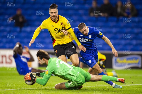 021122 - Cardiff City v Watford - Sky Bet Championship - Watford goalkeeper Daniel Bachmann claims the ball in front of Francisco Sierralta of Watford & Max Watters of Cardiff City