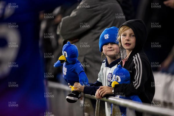 021122 - Cardiff City v Watford - Sky Bet Championship - Young Cardiff City fans smile at Bartley the Bluebird
