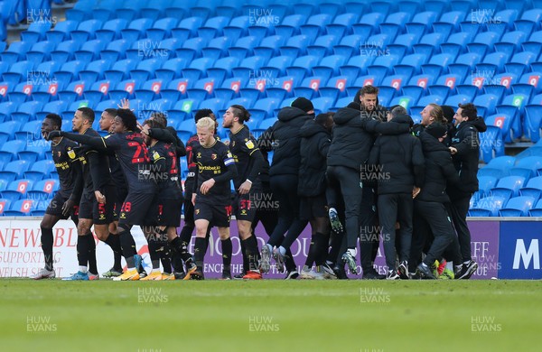 130321 Cardiff City v Watford, Sky Bet Championship - Watford players and management mob Adam Masina after he scores the winning goal in added time