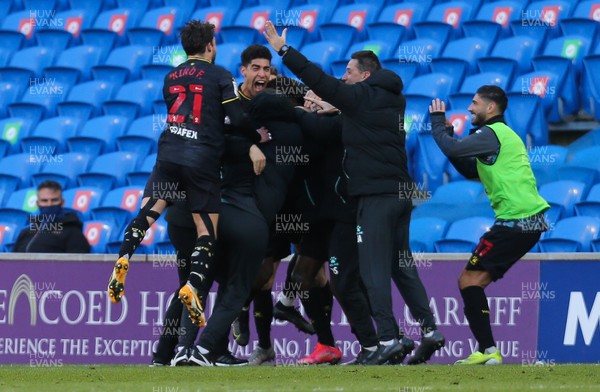 130321 Cardiff City v Watford, Sky Bet Championship - Adam Masina of Watford races away to celebrate after scoring the winning goal in added time