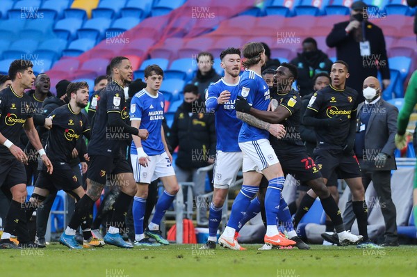 130321 Cardiff City v Watford, Sky Bet Championship - Aden Flint of Cardiff City is restrained at the end of the match as Cardiff concede the winning goal in added time