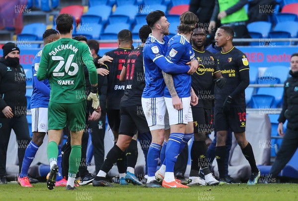 130321 Cardiff City v Watford, Sky Bet Championship - Aden Flint of Cardiff City is restrained at the end of the match as Cardiff concede the winning goal in added time
