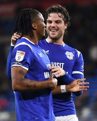 131026 - Cardiff City v Watford - Sky Bet Championship - Gabriel Osho of Cardiff City celebrates with Ollie Tanner of Cardiff City after Mattie Pollock of Watford scores an own goal