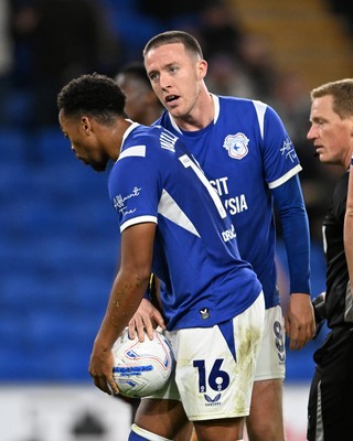 131026 - Cardiff City v Watford - Sky Bet Championship - Chris Willock of Cardiff City and Jack Moylan of Cardiff City have a disagreement on who should take the penalty
