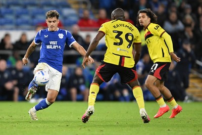 131026 - Cardiff City v Watford - Sky Bet Championship - Alex Robertson of Cardiff City is challenged by Edo Kayembe of Watford