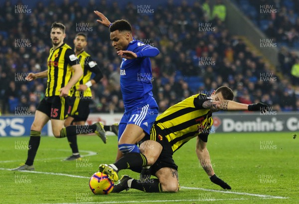 220219 - Cardiff City v Watford, Premier League - Josh Murphy of Cardiff City is brought down by Daryl Janmaat of Watford on the edge of the penalty area
