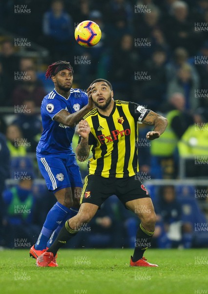 220219 - Cardiff City v Watford, Premier League - Leandro Bacuna of Cardiff City and Troy Deeney of Watford compete for the ball 