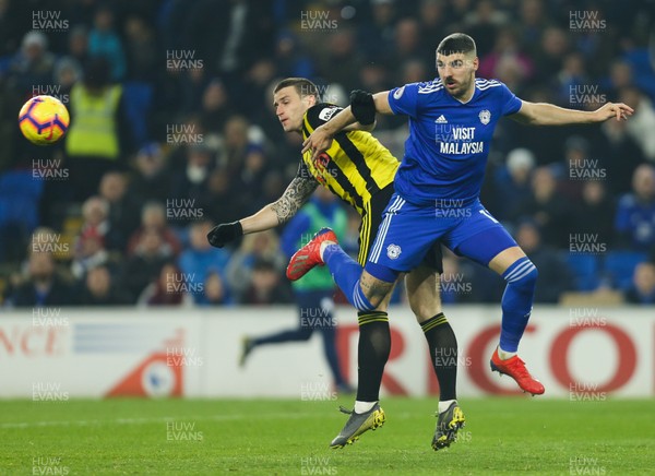 220219 - Cardiff City v Watford, Premier League - Callum Paterson of Cardiff City and Daryl Janmaat of Watford compete for the ball