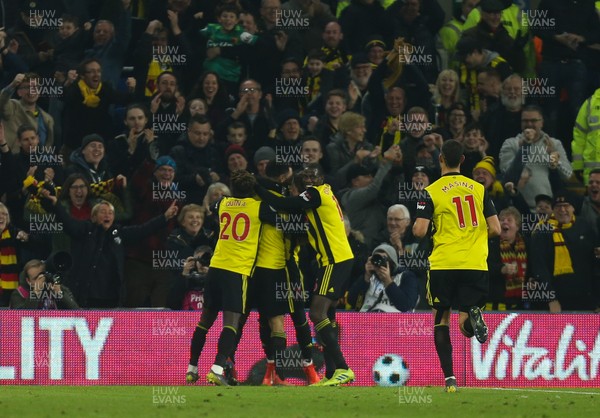 220219 - Cardiff City v Watford, Premier League - Watford players celebrate after scoring the fourth goal