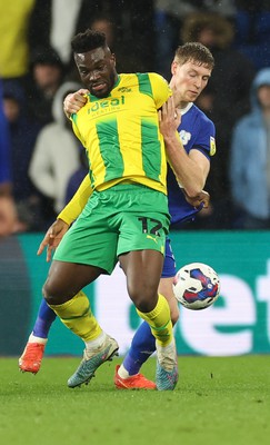 150323 - Cardiff City v West Bromwich Albion, EFL Sky Bet Championship - Daryl Dike of West Bromwich Albion and Mark McGuinness of Cardiff City compete for the ball