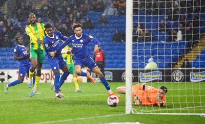 150323 - Cardiff City v West Bromwich Albion, EFL Sky Bet Championship - Sory Kaba of Cardiff City, left and Kion Etete of Cardiff City look on as Kaba’s header beats \West Bromwich Albion goalkeeper Josh Griffiths to score goal