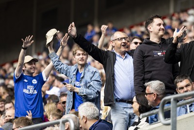 260425 - Cardiff City v West Bromwich Albion - Sky Bet Championship - Cardiff City fans react to the away end