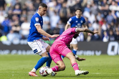 260425 - Cardiff City v West Bromwich Albion - Sky Bet Championship - Yousef Salech of Cardiff City fouls Kyle Bartley of West Brom