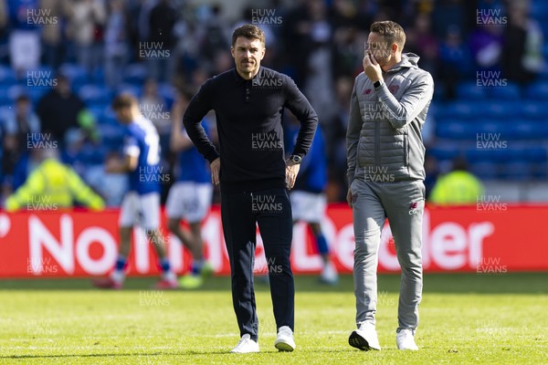260425 - Cardiff City v West Bromwich Albion - Sky Bet Championship - Cardiff City interim manager Aaron Ramsey & Cardiff City assistant manager Chris Gunter at full time